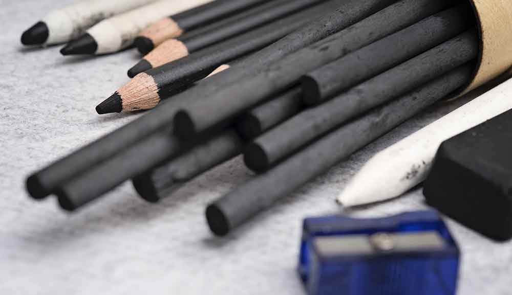 Cómo se originó grafito que contienen lápices?